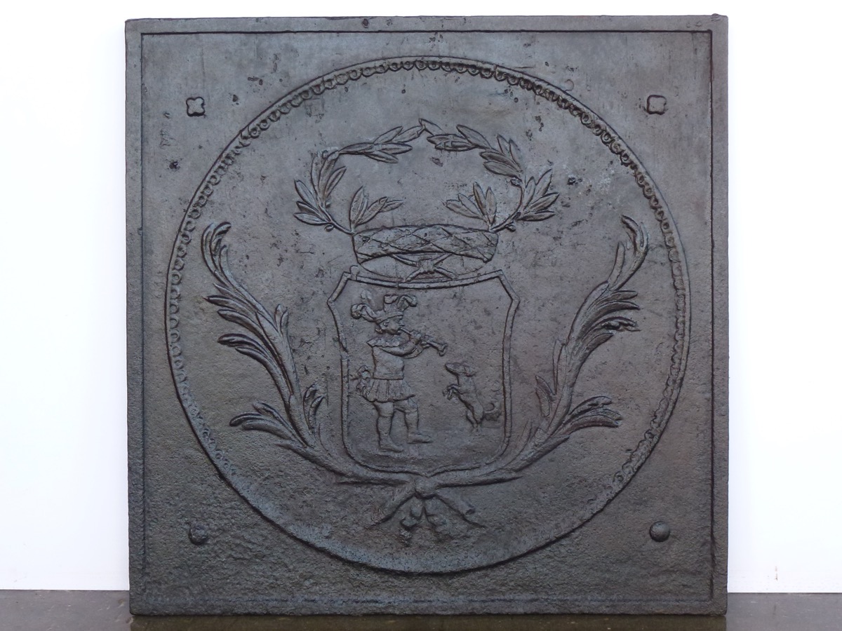 Plaque de cheminée au saltimbanque dresseur de chien - XIXe S.